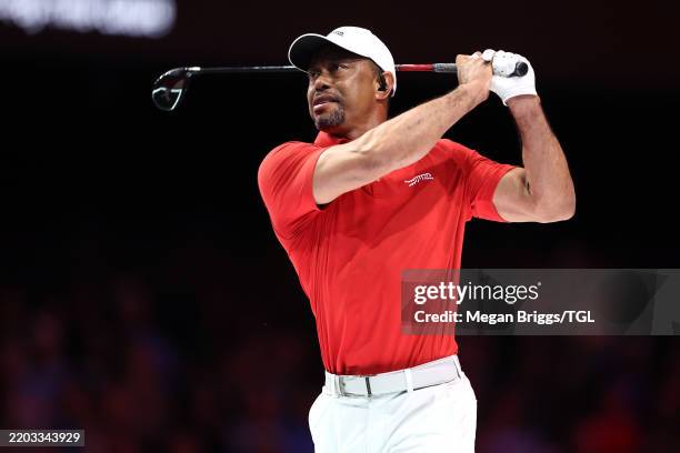 Tiger Woods of Jupiter Links Golf Club plays a shot during their TGL presented by SoFi match against the Atlanta Drive GC at SoFi Center on March 04,...