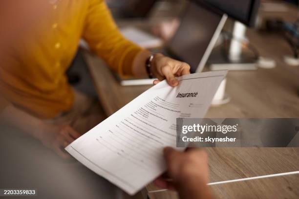 here are insurance papers! - insurance stock pictures, royalty-free photos & images