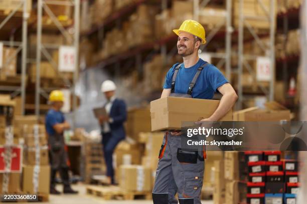 Carry Work 5,225 Warehouse Box Carry Stock Photos, High-Res Pictures, and Images ...