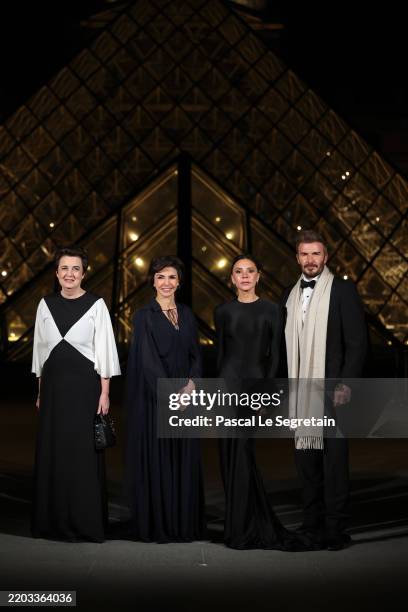 Laurence des Cars, Rachida Dati, Victoria Beckham and David Beckham attend the "Le Grand Diner du Louvre" Passage Richelieu Photocall at Musee du...