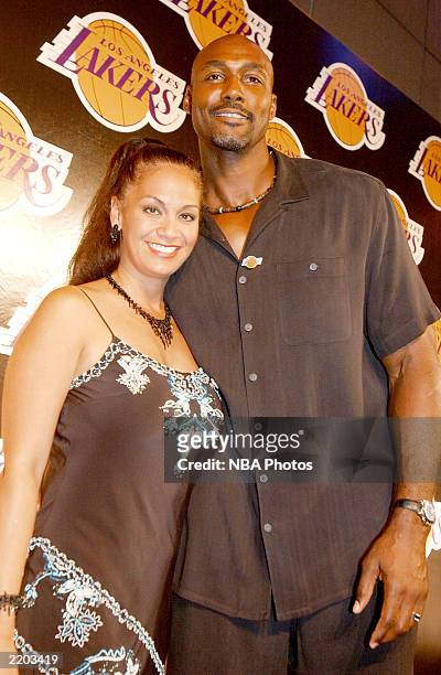 Basketball player Karl Malone and wife Kay attend a party held for Gary Payton and Karl Malone celebrating both Los Angeles Lakers players' birthdays...