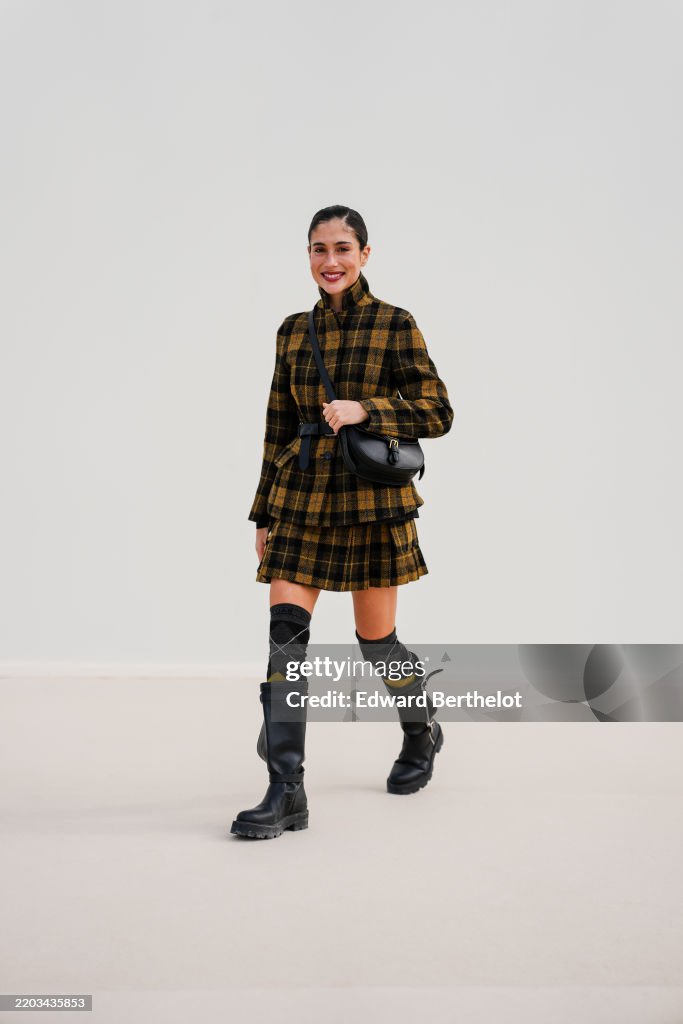 Street Style - Paris Fashion Week - Womenswear Fall/Winter 2025/2026 - Day Two