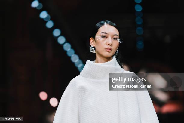 Model showcases designs by Capellazzo Couture the Glam Up Runway during the Melbourne Fashion Festival 2025 at Royal Exhibition Building on March 05,...
