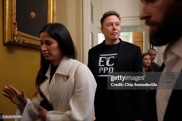 White House Senior Advisor to the President, Tesla and SpaceX CEO Elon Musk is accompanied by Katie Miller as he leaves a meeting with Senate...