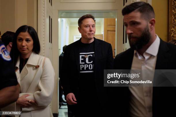 White House Senior Advisor to the President, Tesla and SpaceX CEO Elon Musk is accompanied by Katie Miller as he leaves a meeting with Senate...