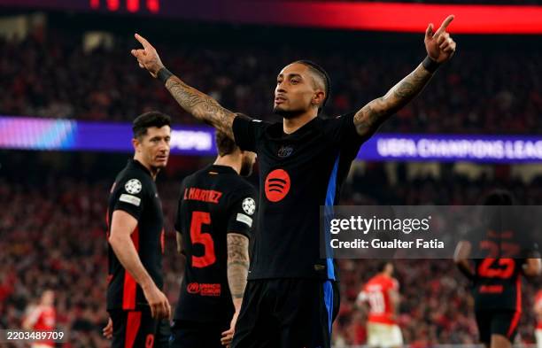 Raphinha of FC Barcelona celebrates scoring his team's first goal during the UEFA Champions League 2024/25 Round of 16 first Leg match between SL...