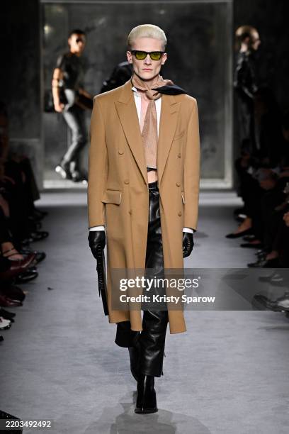 Model walks the runway during the Tom Ford Womenswear Fall/Winter 2025-2026 show as part of Paris Fashion Week on March 05, 2025 in Paris, France.