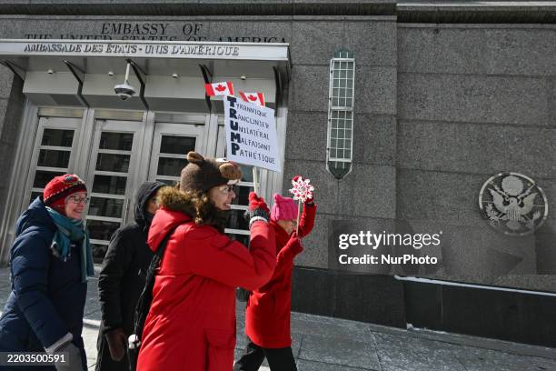 Protesters gather outside the U.S. Embassy for the 'Ottawa Ensemble pour Nos Filles' demonstration, organized by Mothers Out Front on International...