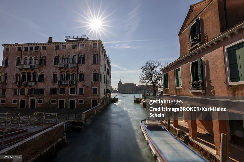 View over a canal to Molino Stucky, Venice, Italy, Europe