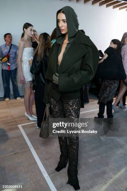 Model poses backstage prior to the Stella McCartney Womenswear Fall/Winter 2025-2026 show as part of Paris Fashion Week at on March 05, 2025 in...