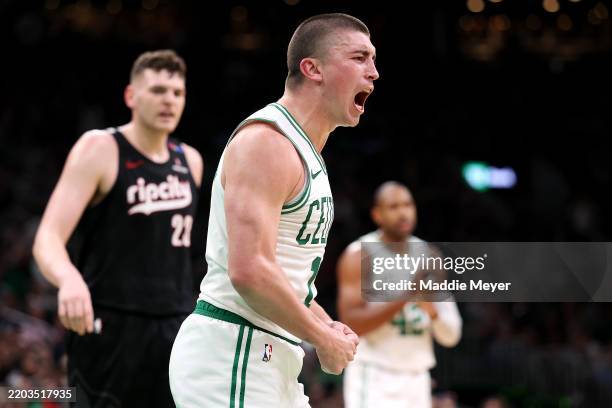 Payton Pritchard of the Boston Celtics celebrates after scoring against the Portland Trail Blazers during the second quarter at TD Garden on March...