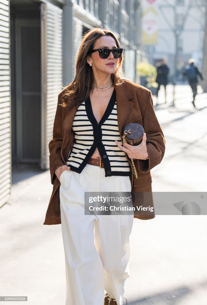 Street Style - Paris Fashion Week - Womenswear Fall/Winter 2025/2026 - Day Three