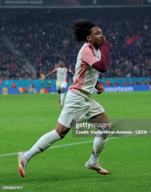 Malick Fofana of Olympique Lyonnais celebrates scoring his team's second goal during the UEFA Europa League 2024/25 Round of 16 First Leg match...