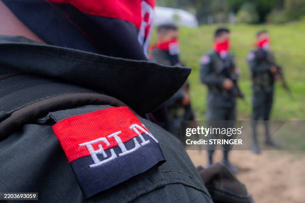National Liberation Army ELN rebels of the Manuel Vazquez Castano northeastern war front stand guard at Catatumbo region, Colombia on March 8, 2025....