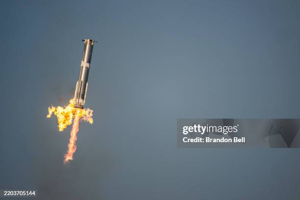 The SpaceX Starship Flight 8 booster returns returns from its ascent at Boca Chica beach on March 06, 2025 in Boca Chica Beach, Texas. The SpaceX...