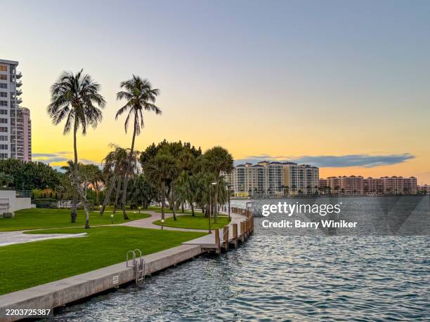 waterfront at dusk at lake boca raton - boca raton stock pictures, royalty-free photos & images