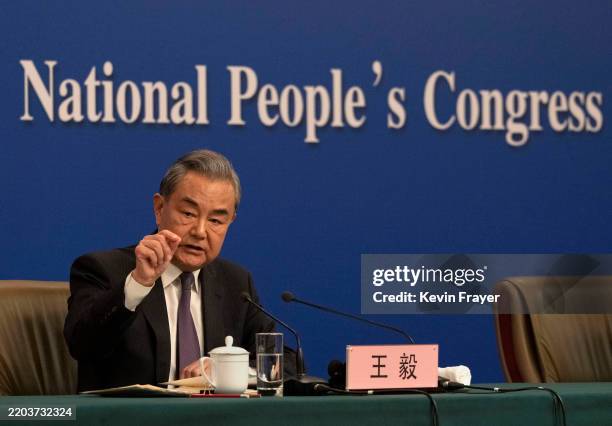 Chinese Foreign Minister Wang Yi speaks at a news conference on the sidelines of the Two Sessions on March 7, 2025 in Beijing, China. China's annual...