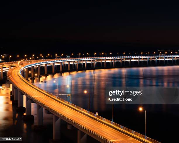 cross-sea bridge at night - bridge architecture up close night stock pictures, royalty-free photos & images