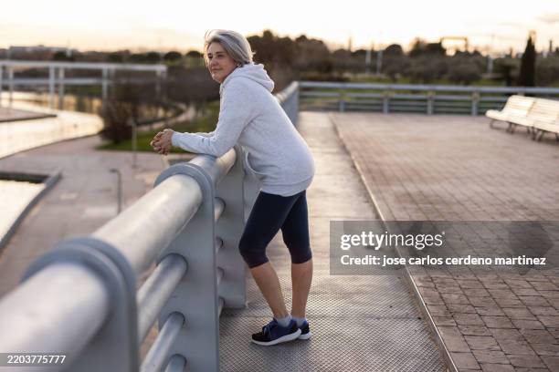 Resting On Railing 18,067 Leaning On Railing Stock Photos, High-Res Pictures, and Images ...