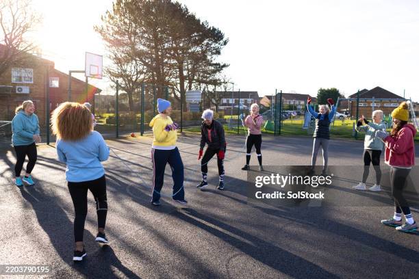 outdoor fitness training with friends - asian jump rope stock pictures, royalty-free photos & images