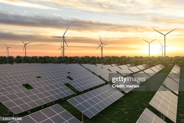 solar panels and wind turbines, 3d rendering - economía verde fotografías e imágenes de stock