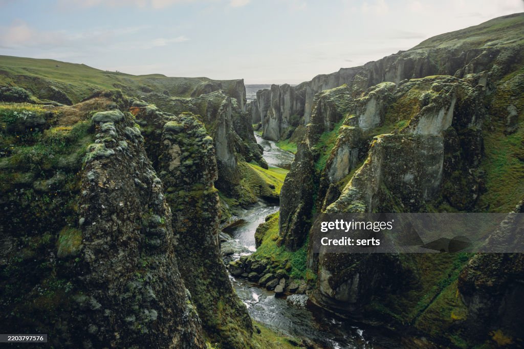Majestic Fjadrargljufur Canyon with a Serpentine River in South Iceland