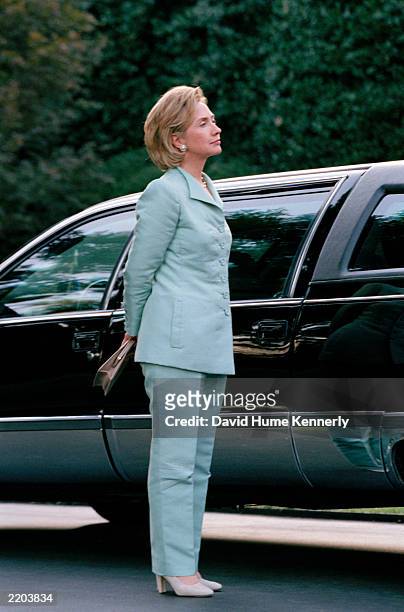 First Lady Hillary Clinton waits to depart with husband U.S President Bill Clinton after a Democratic Business Leaders event September 10, 1998 in...