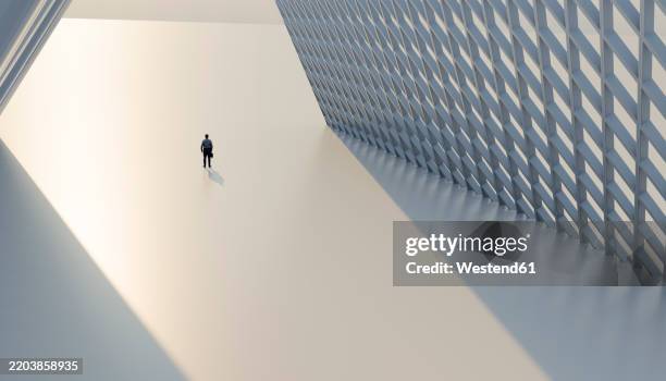 man standing in sunlight amidst 3d structure - light shadow architecture stock illustrations