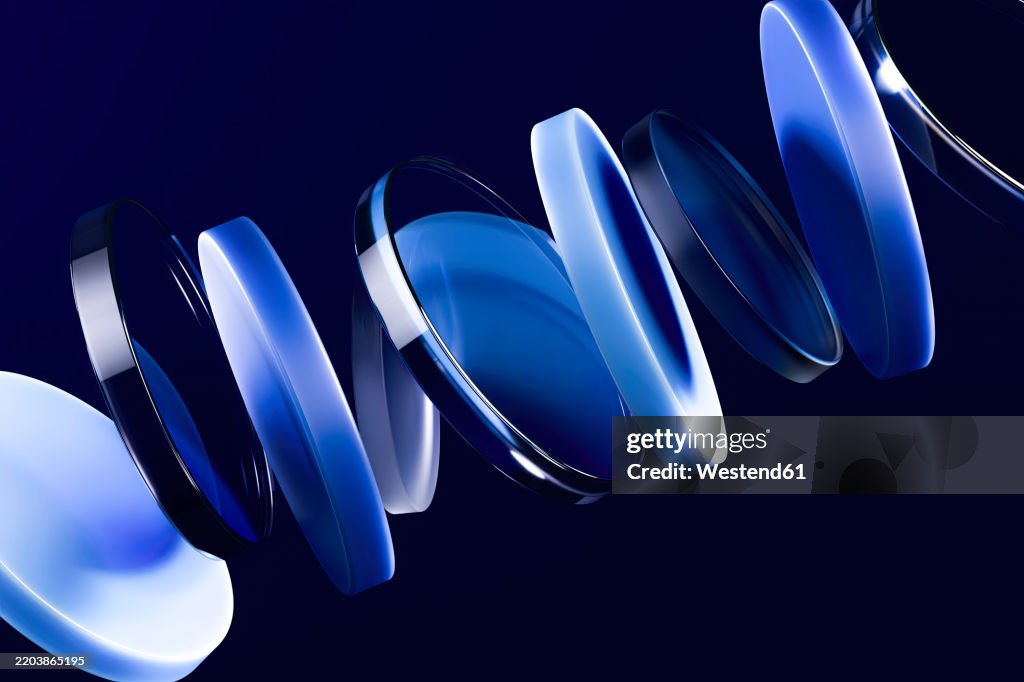 3D rendering abstract of glass circles over navy blue background