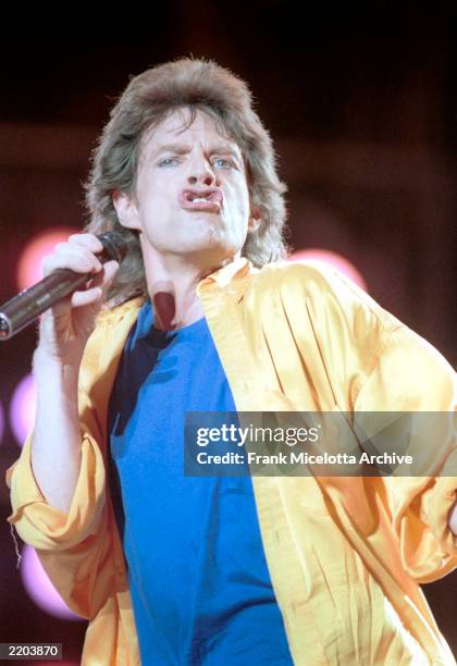 Mick Jagger performs for a sold out crowd at the Live Aid concert at JFK Stadium in Philadelphia, Pennsylvania, July 13, 1985. Jagger will celebrate...