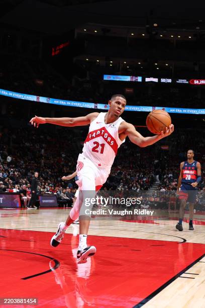 Orlando Robinson of the Toronto Raptors grabs the rebound during the game against the Washington Wizards on March 10, 2025 at the Scotiabank Arena in...