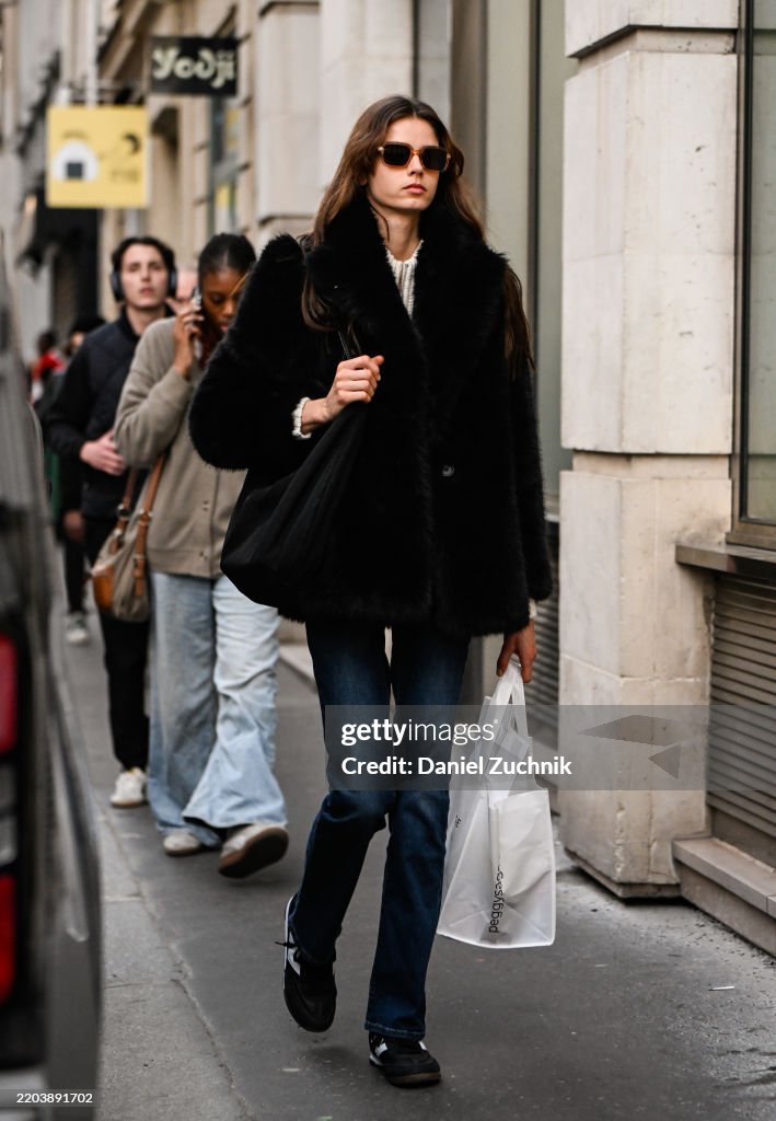 Street Style - Paris Fashion Week - Womenswear Fall/Winter 2025/2026 - Day Five