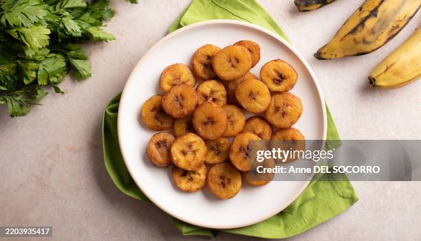fried plantain bananas for meal - fried stock pictures, royalty-free photos & images