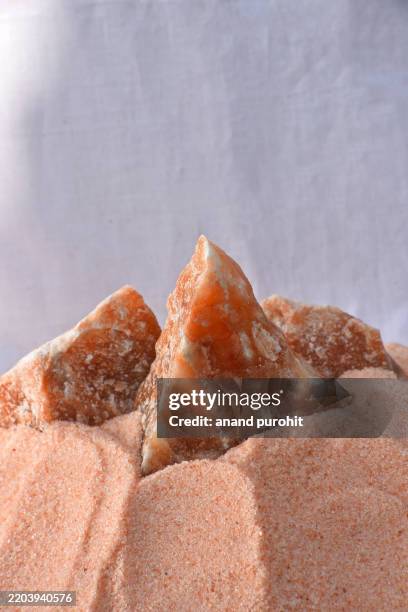 Pink Salt Rocks Border 160 Himalayan Pink Salt Rock Stock Photos, High-Res Pictures, and ...