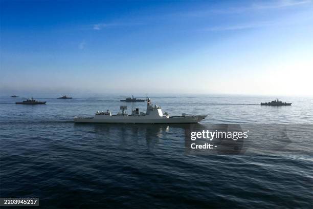 This handout photo made available by the Iranian Army Office on March 11, 2025 shows the Chinese People's Liberation Army Navy guided-missile...