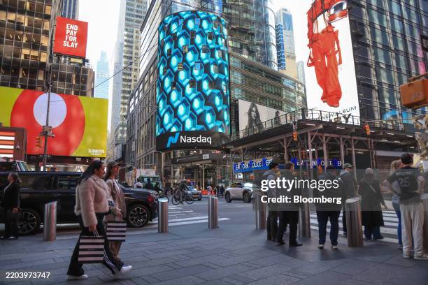 The Nasdaq MarketSite in New York, US, on Tuesday, March 11, 2025. The stock market on Monday shifted towards defensive sectors such as energy,...