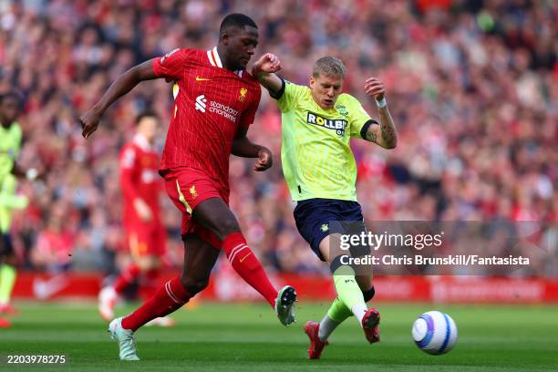 Ibrahima Konate of Liverpool in action with Albert Gronbaek Erlykke of Southampton during the Premier League match between Liverpool FC and...