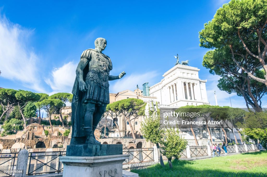 Caesar Stand A Statue Of Julius Caesar Stands In Front Of Imperial Forum High-Res ...