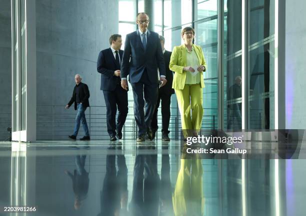 Friedrich Merz , chancellor designate and leader of the Christian Democrats , Markus Soeder, leader of the Bavarian Christian Democrats and Lars...