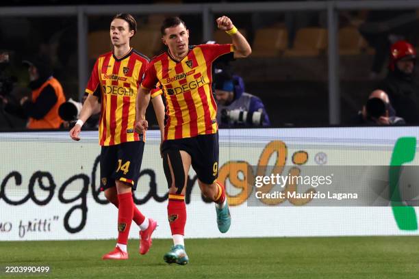 Nikola Krstovic of Lecce celebrates after scoring his team's opening goal during the Serie A match between Lecce and AC Milan at Stadio Via del Mare...