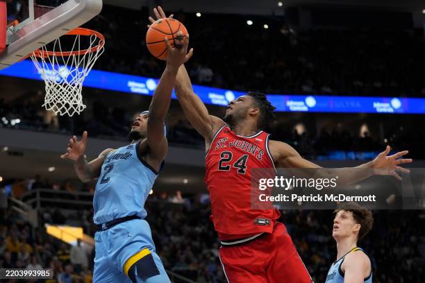 Zuby Ejiofor of the St. John's Red Storm fouls home Chase Ross of the Marquette Golden Eagles during the first half at Fiserv Forum on March 08, 2025...