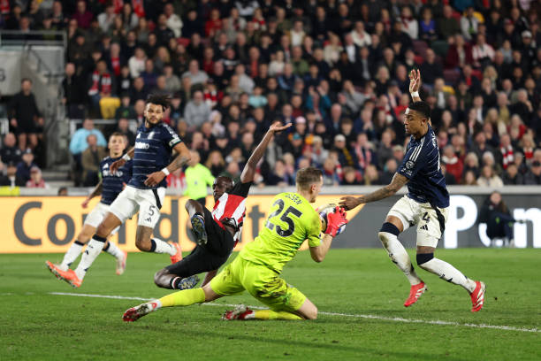 Robin Olsen of Aston Villa saves the shot of Yoane Wissa of Brentford during the Premier League match between Brentford FC and Aston Villa FC at...