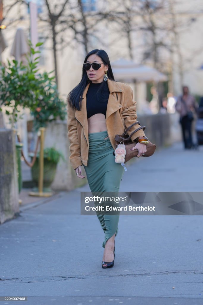 Street Style - Paris Fashion Week - Womenswear Fall/Winter 2025/2026 - Day Four