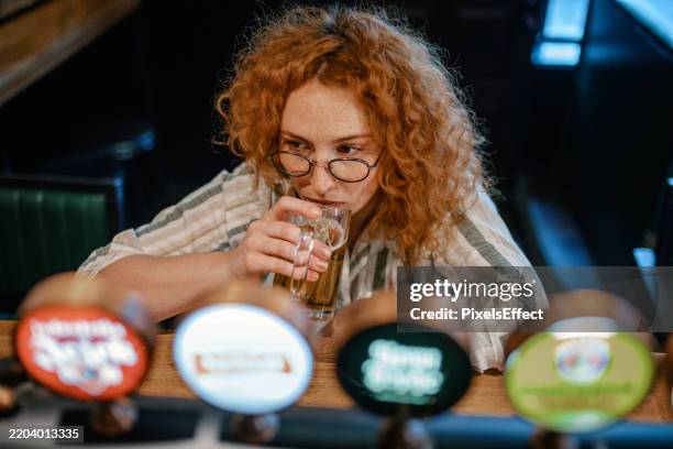 a drink for comfort or escape - drunk stock pictures, royalty-free photos & images