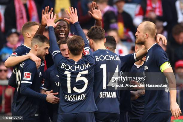 Ibrahima Sissoko of VfL Bochum celebrates scoring his team's second goal with teammates during the Bundesliga match between FC Bayern München and VfL...