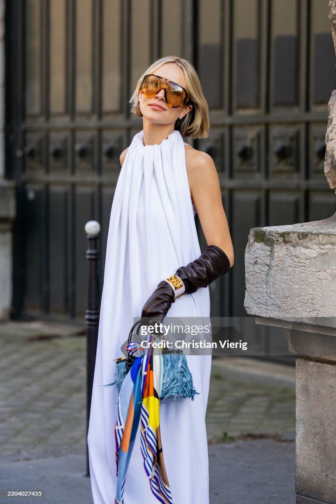 Street Style - Paris Fashion Week - Womenswear Fall/Winter 2025/2026 - Day Six