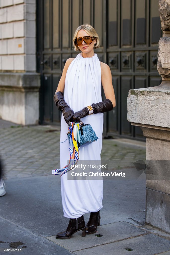 Street Style - Paris Fashion Week - Womenswear Fall/Winter 2025/2026 - Day Six