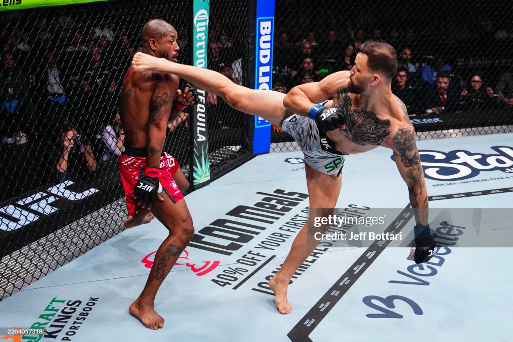 Marc Ruffy Mauricio Ruffy of Brazil kicks King Green in a lightweight fight ...