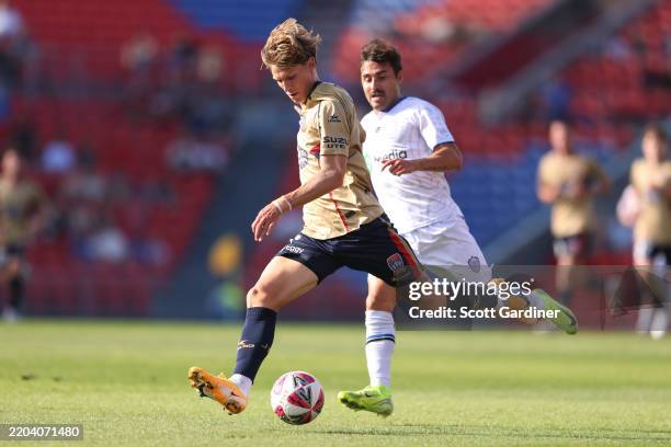 Eli Adams of the Jets scores a goal during the round 22 A-League Men match between Newcastle Jets and Auckland FC at McDonald Jones Stadium, on March...