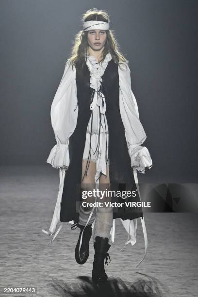 Model walks the runway during the Ann Demeulemeester Ready to Wear Fall/Winter 2025-2026 fashion show as part of the Paris Fashion Week on March 8,...